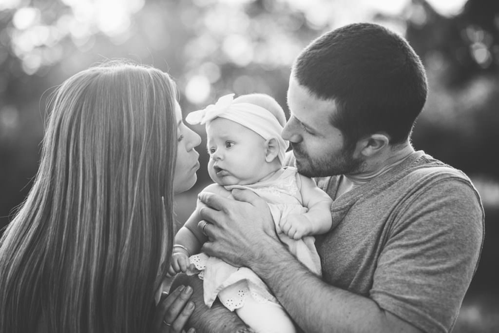 close up baby looking at mom