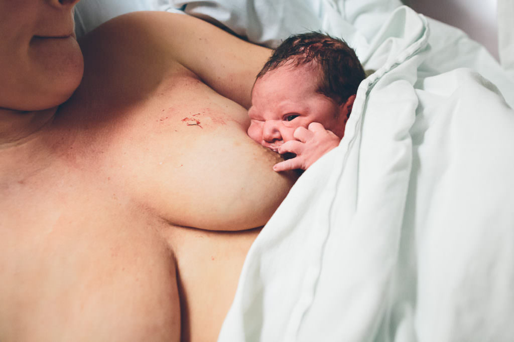 baby boy breastfeeding and doing skin to skin after vbac birth
