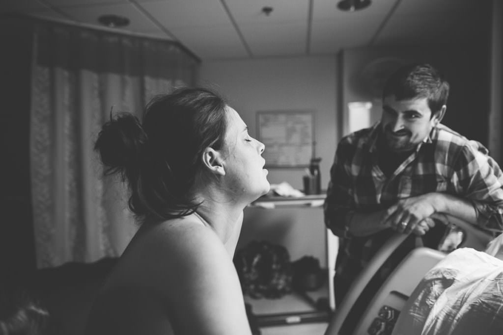 laboring mom gets a restful break, she is relaxed with eyes closed