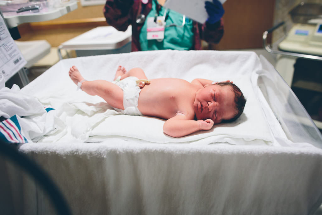 newborn baby boy on warmer at burdett birth center