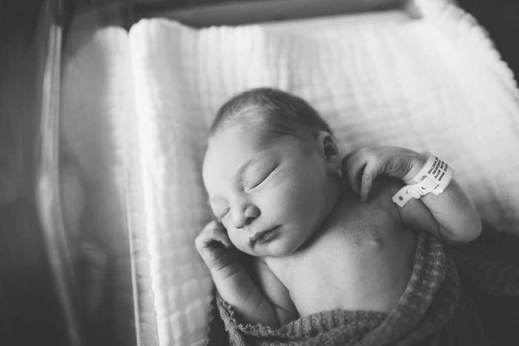 newborn sleeping in bassinet at St. Peters hospital Albany NY fresh 48 photographer