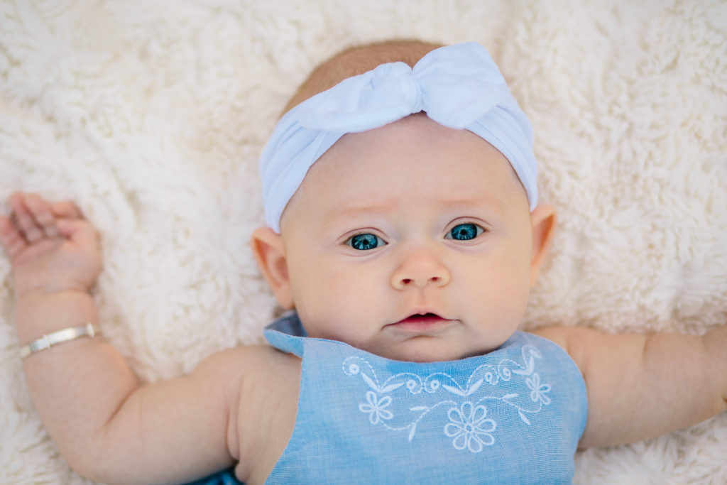baby girl lying on blanket in Clifton Park New York