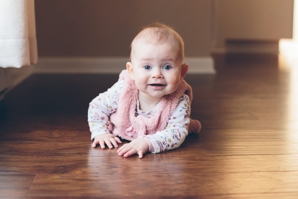 Saratoga Springs New York baby photographer baby girl on tummy