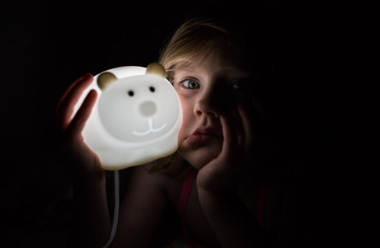little girl holding night light NY family lifestyle photographer