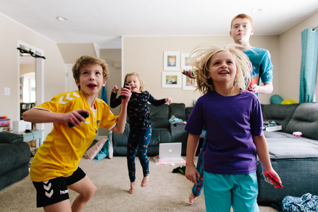 playing on a nintendo switch child lifestyle photography