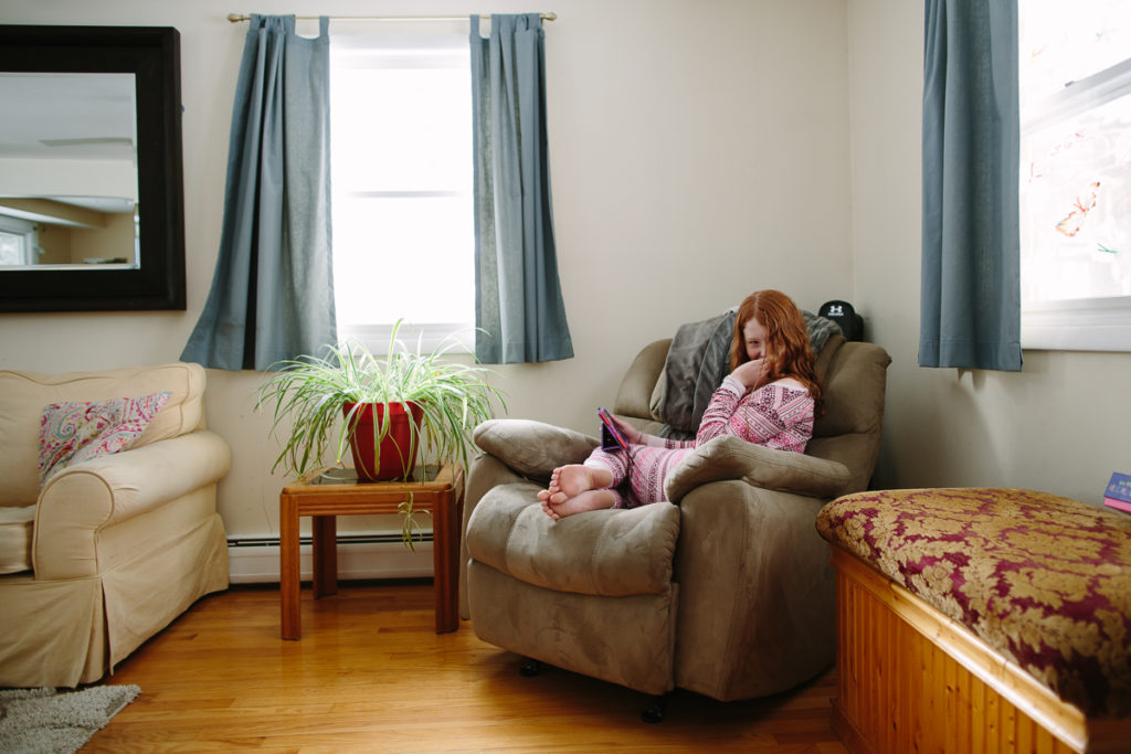 girl reading in chair lifestyle photogrpahy