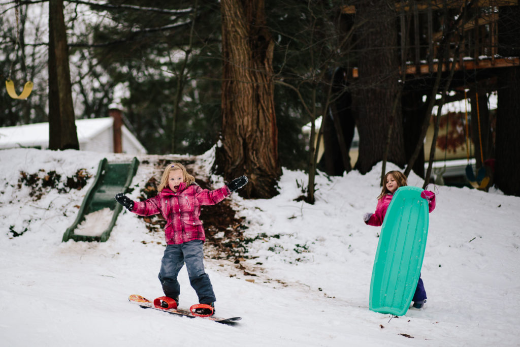 little girl snowboarding upstate ny