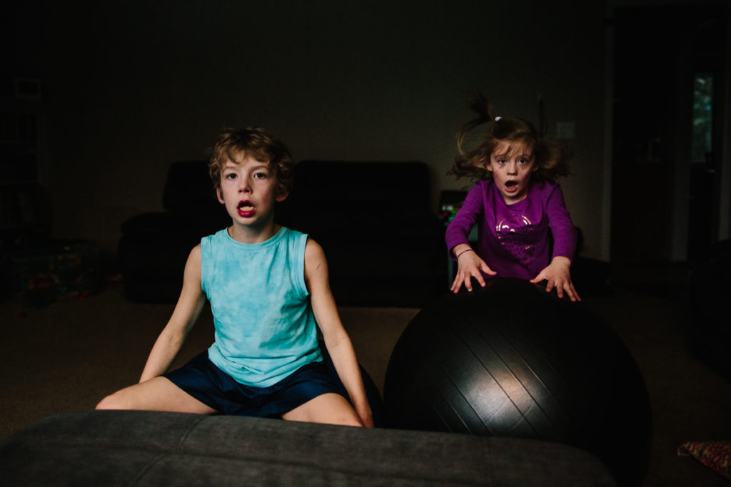 bouncing on exercise ball clifton park family photographer