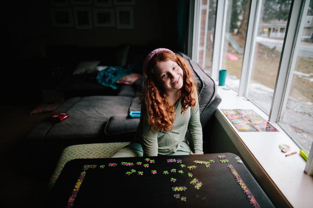 tween building a puzzle ny lifestyle photogrpaher