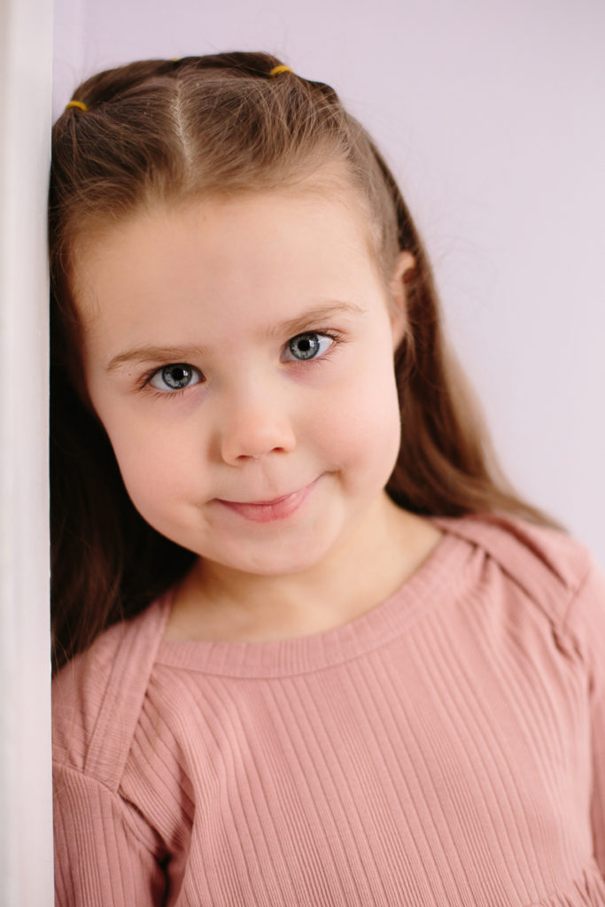 portrait of a blue eye brown hair girl