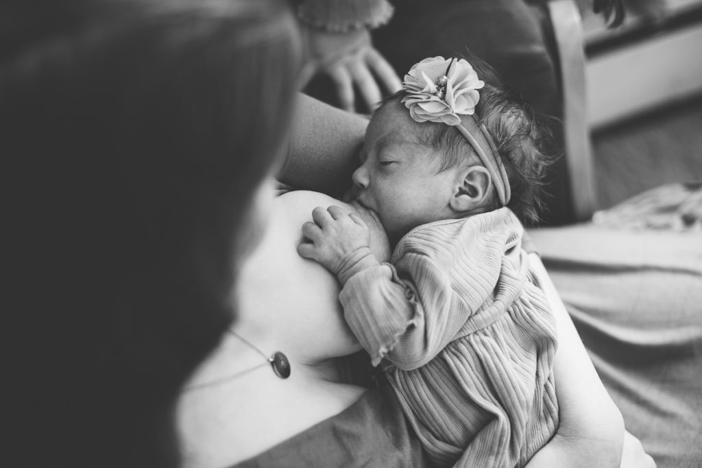 Newborn baby girl breastfeeding albany NY