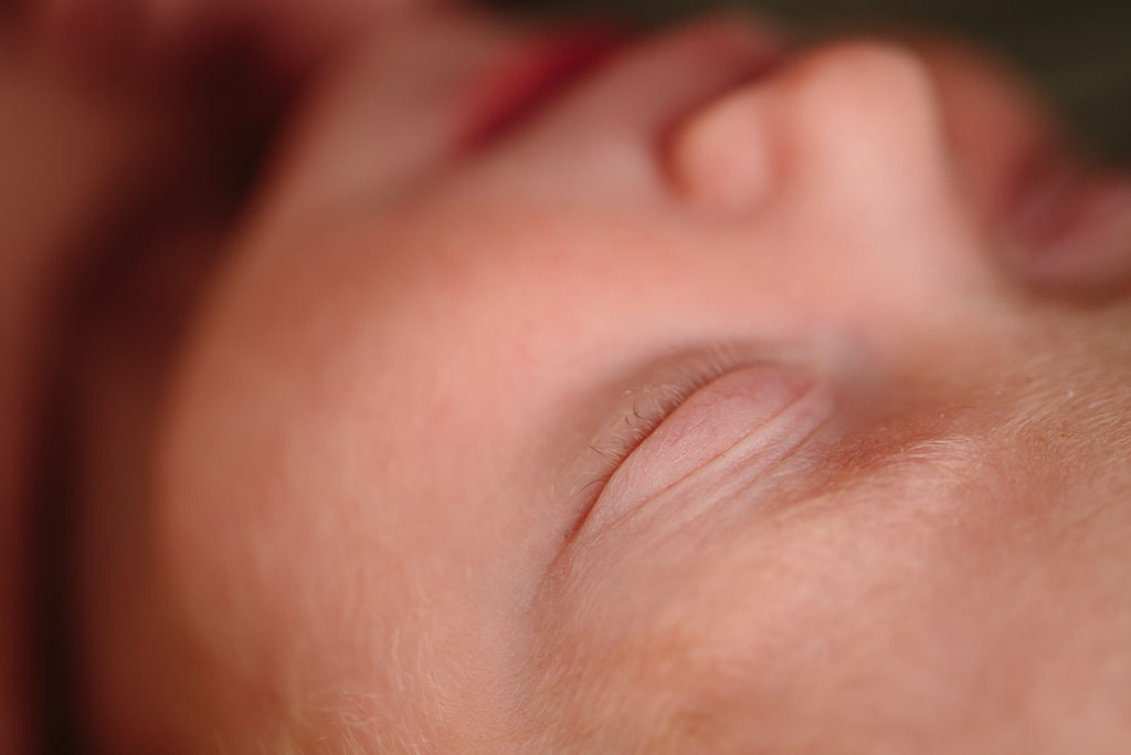 close up shot of newborn girl eyelashes
