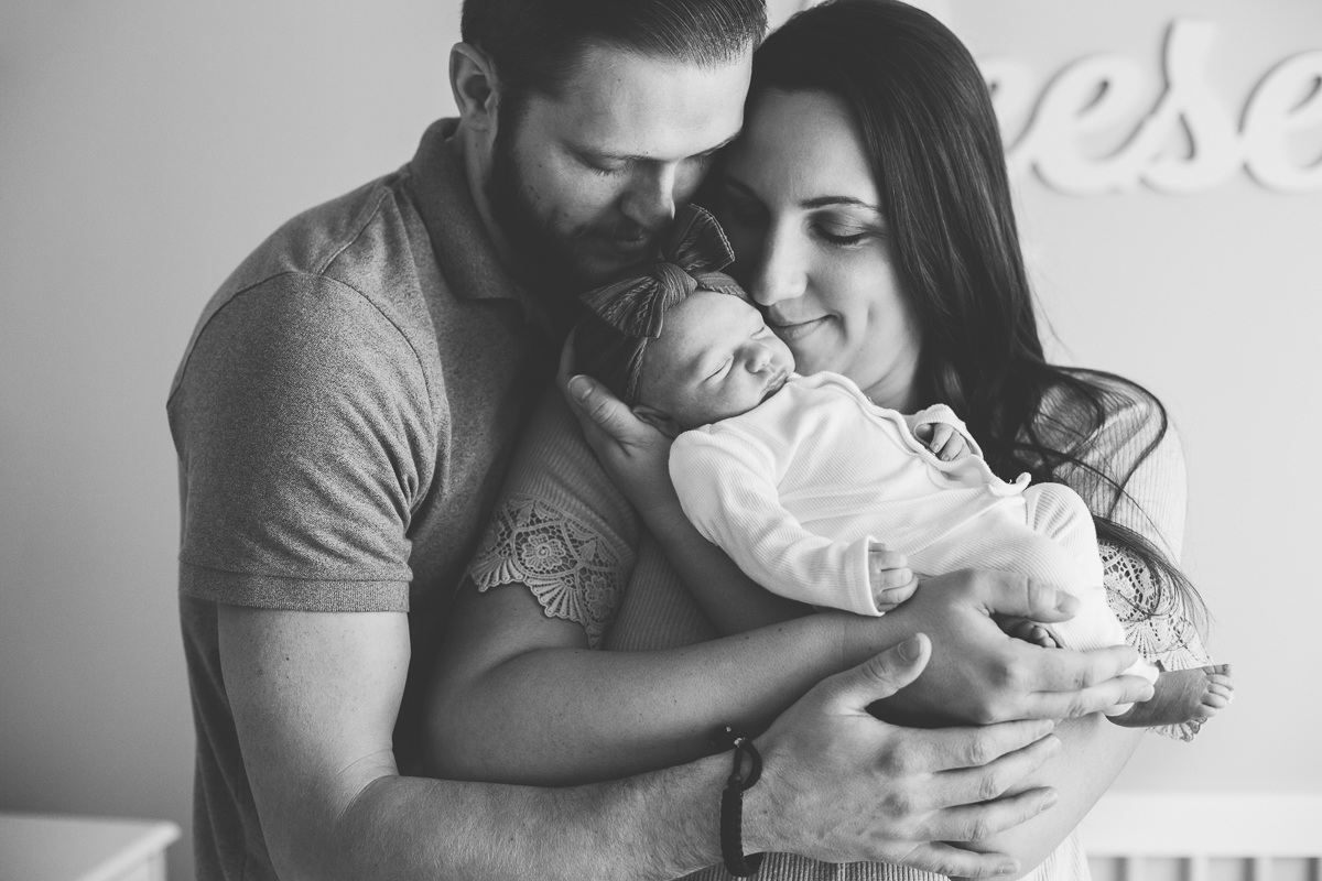 Clifton Park NY Family Photography parents holding baby