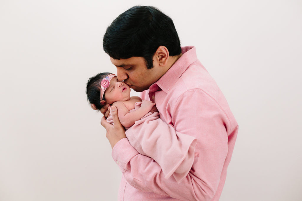 Saratoga NY Lifestyle newborn photography dad holding baby girl