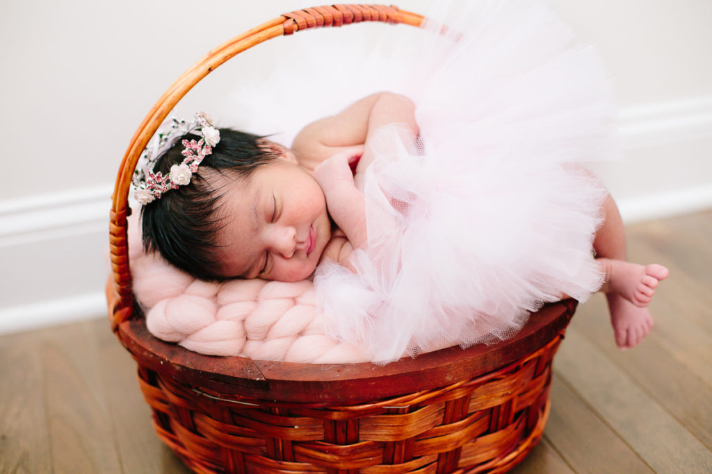 newborn baby girl with little crown and tutu Saratoga NY Lifestyle Newborn Photography