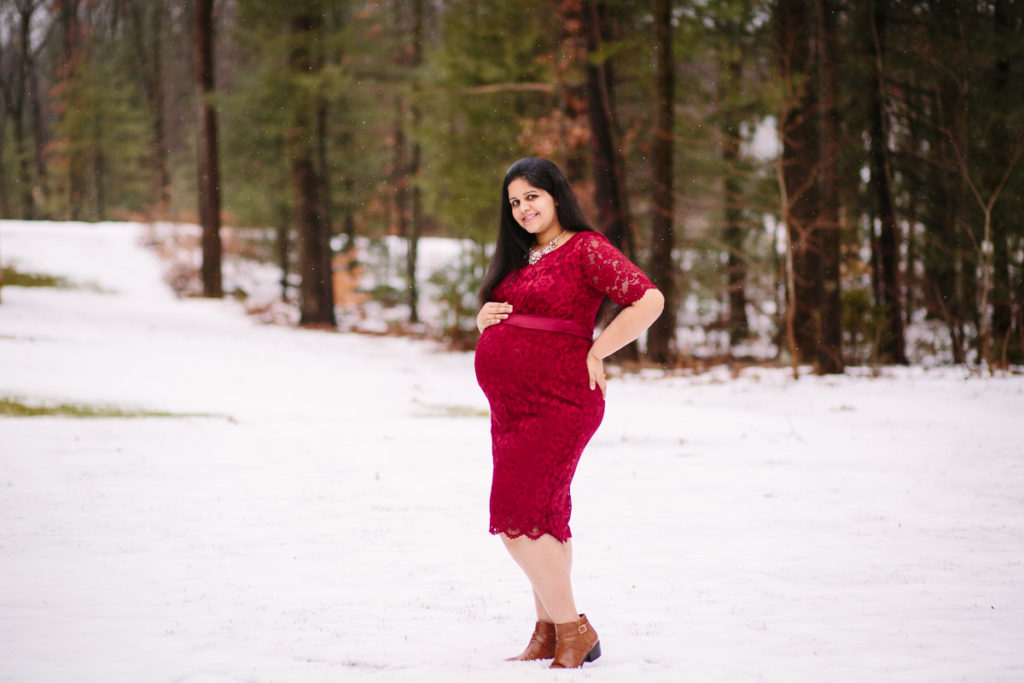 pregnant woman in the snow Clifton Park NY maternity photographer