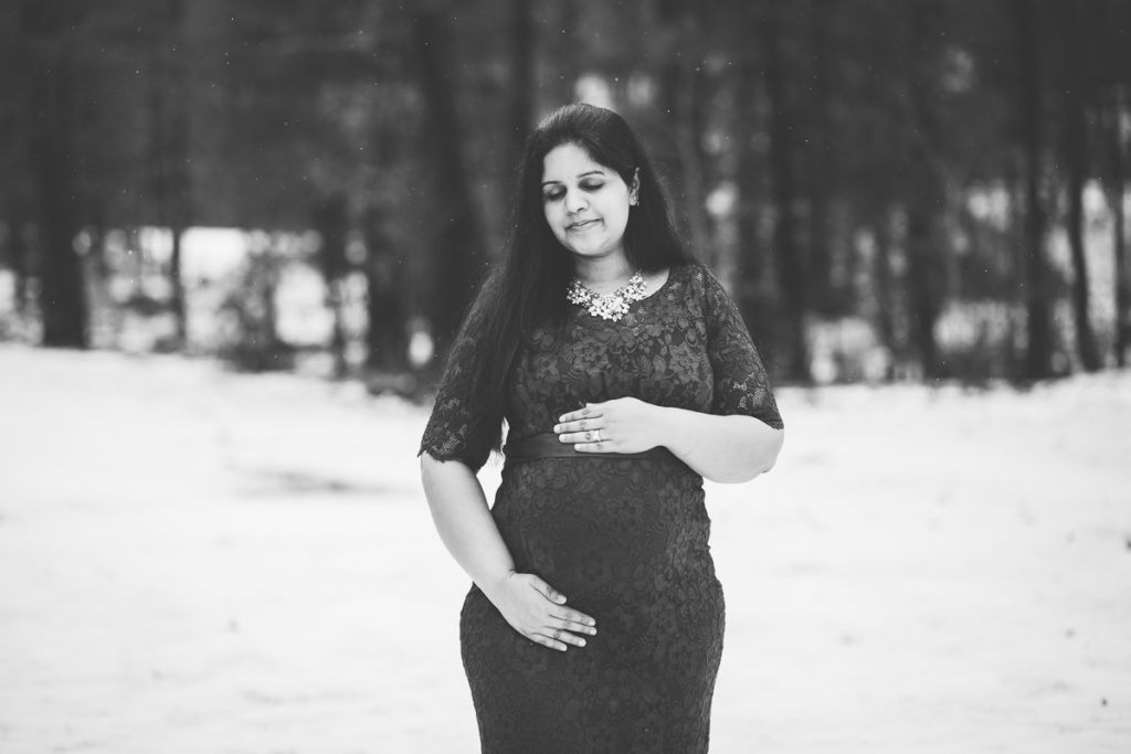 mom hugging pregnant belly clifton park ny