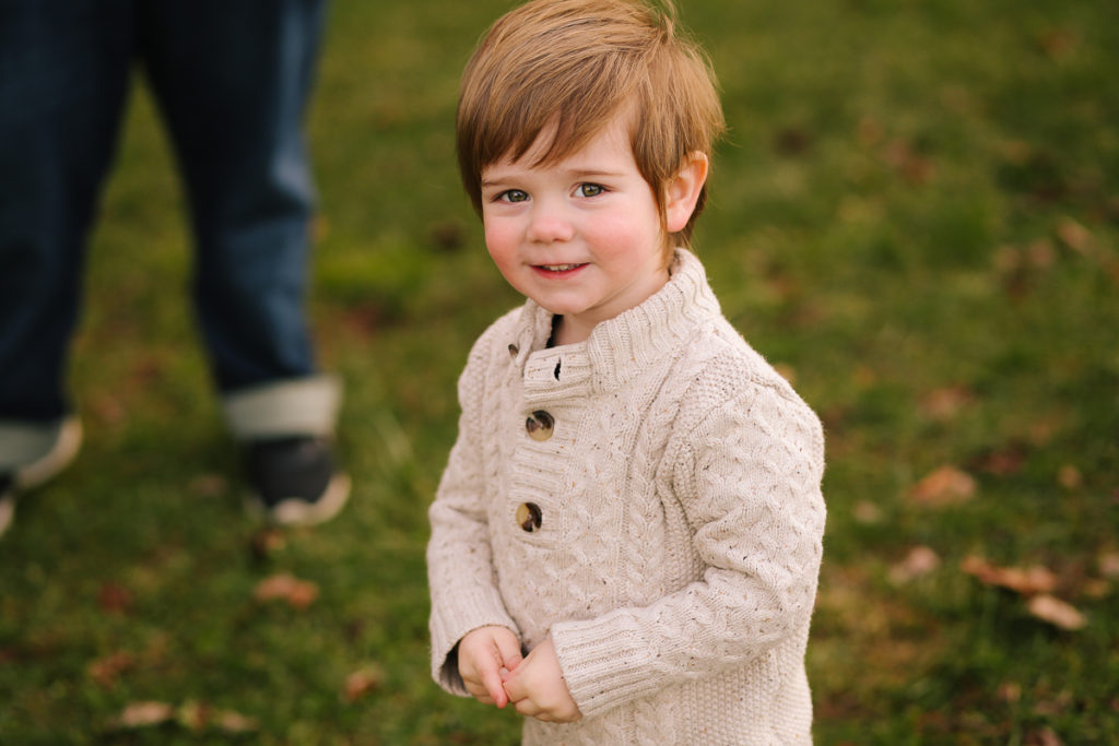 Toddler in tan sweater at Halfmoon Town Park NY