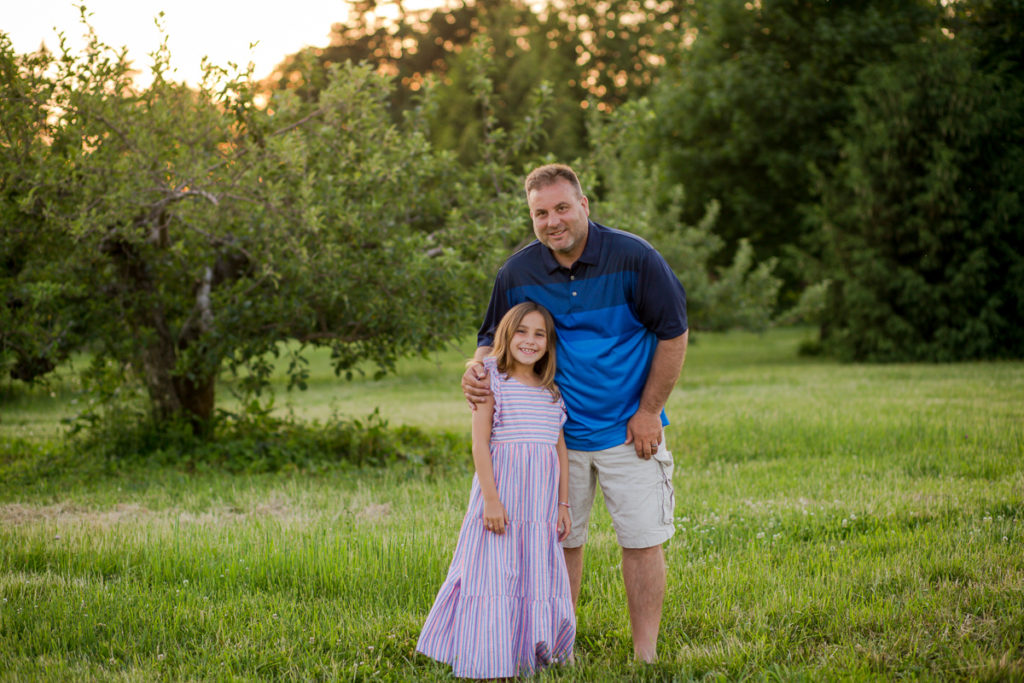 dad standing with daughter at Riverview Orchards Clifton Park NY