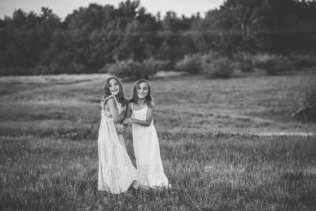 twin girls playing at riverview Orchards Clifton Park NY photography