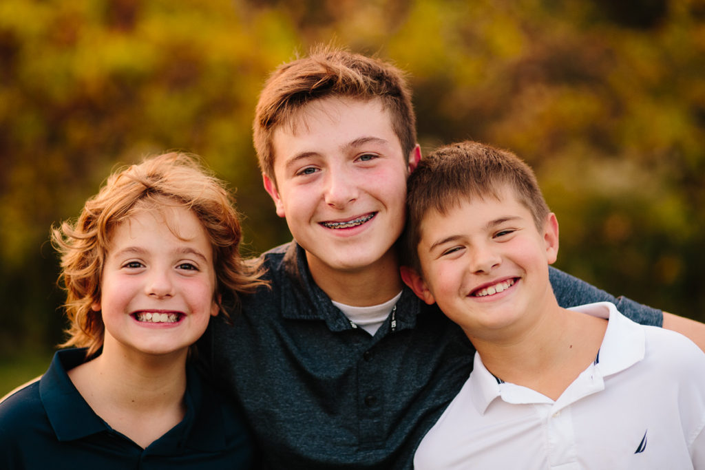 three brothers portrait in the fall