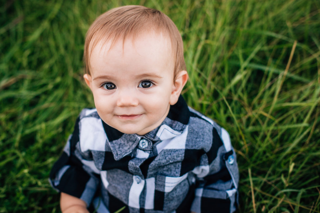 baby boy in black and white plaid